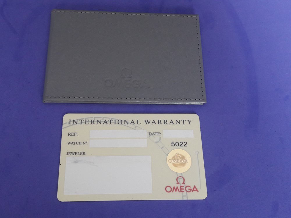 OMEGA INTERNATIONAL GUARANTEE WARRANTY CARD NEW, BLANK + CARD HOLDER