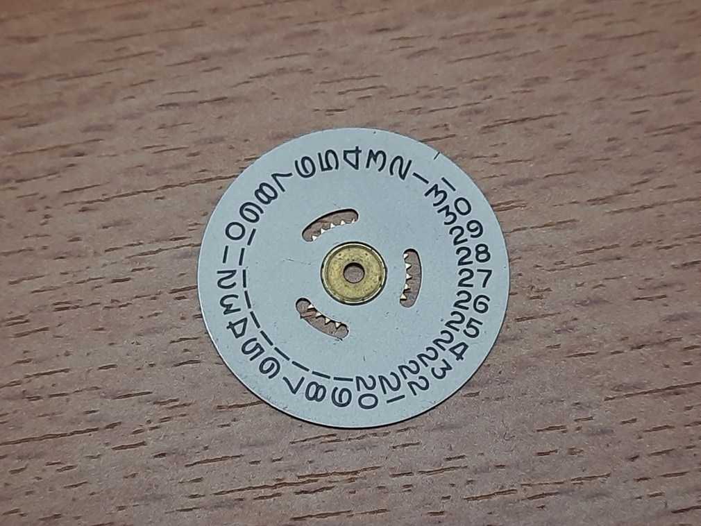 Genuine Rolex date disc for cal 1215 & 1225 ref 7600-2 